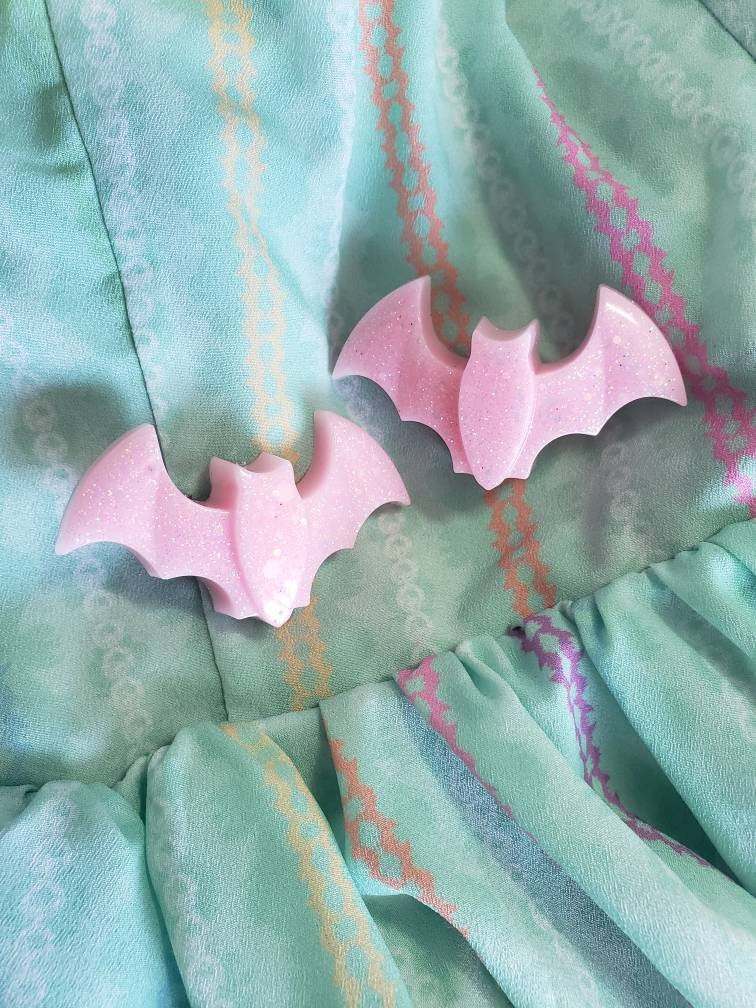 One pair pink bat clips