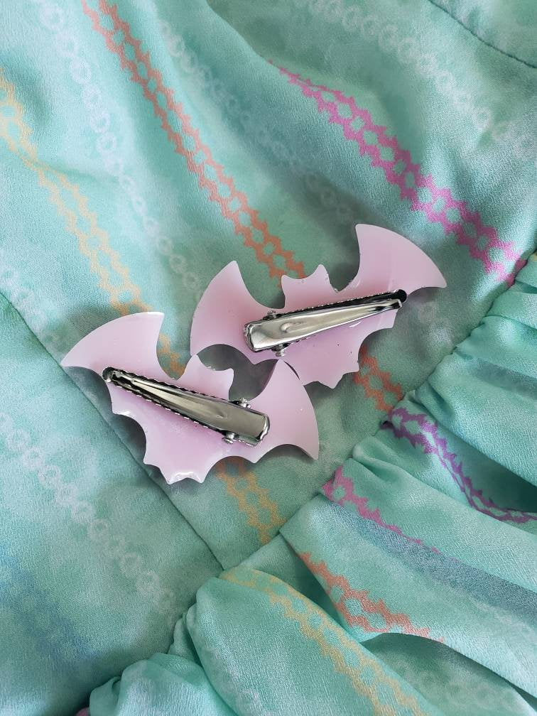 One pair pink bat clips